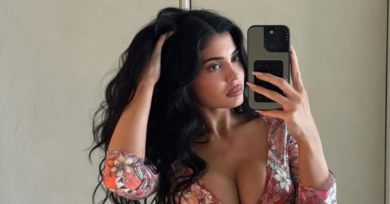Kylie Jenner’s Skintight White Top Flashes a Hint of Abs