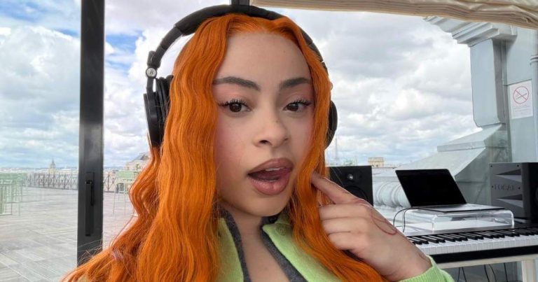 Ice Spice Strikes a Bold Pose as Her Mini Dress Rides Higher