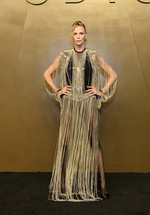 Charlize Handled the China Promotional Leg of The Odyssey