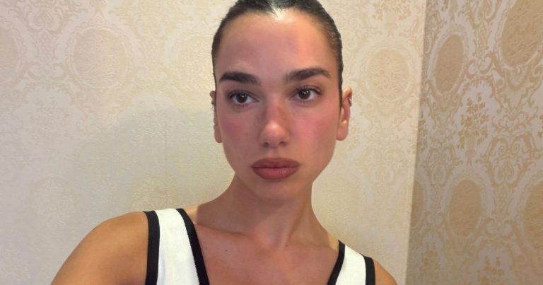 Dua Lipa’s Plunging Chanel Cutout Dress Has a Ridiculously High Slit