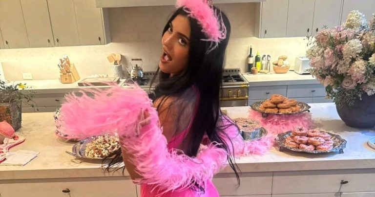 Kylie Jenner’s Lacy Lingerie Peeks Through Tiny Saint Laurent Coat