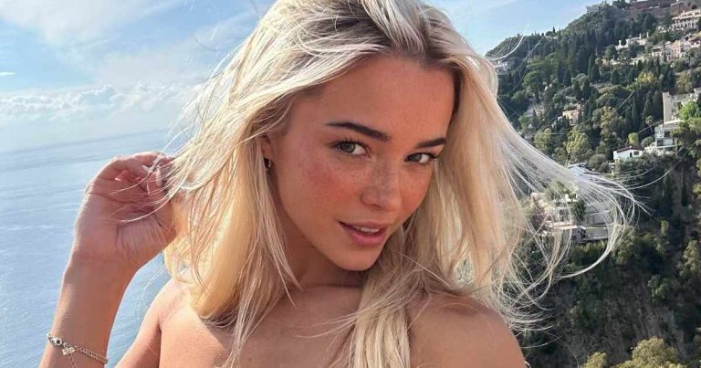 Livvy Dunne Nails Cartwheel & Split on a Beach in Plunging Swimsuit