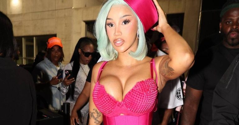 Cardi B Slips Out of Matières Fécales Coat To Reveal Plunging Catsuit & G-String