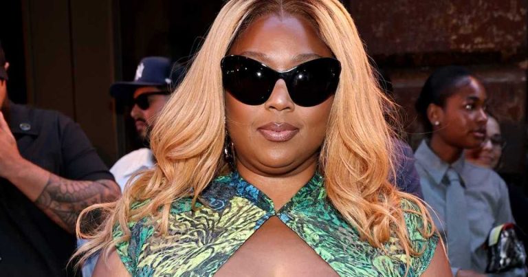 Lizzo’s Kim Shui Dress Has a Plunging Cutout & Thigh-High Slit at NYFW
