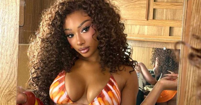 Megan Thee Stallion Sweats It Out in Back-To-Back Plunging Sports Bras
