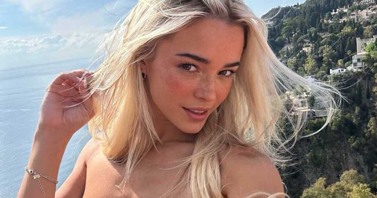 Livvy Dunne’s Shirt Is One Button Away From a Wardrobe Mishap